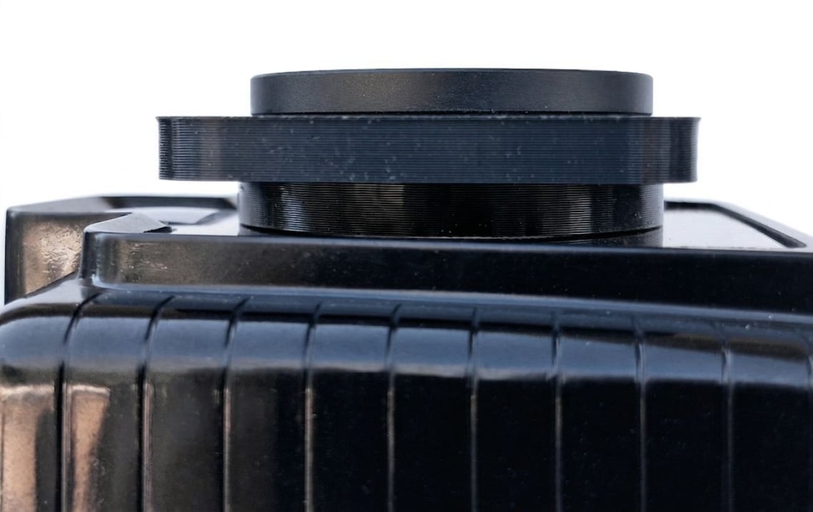 Side view showing rear collar of BoxFilter against face of camera.