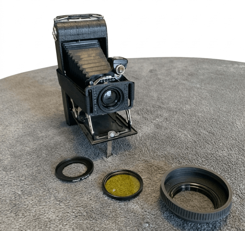 Installed with strap onto a Kodak folding camera